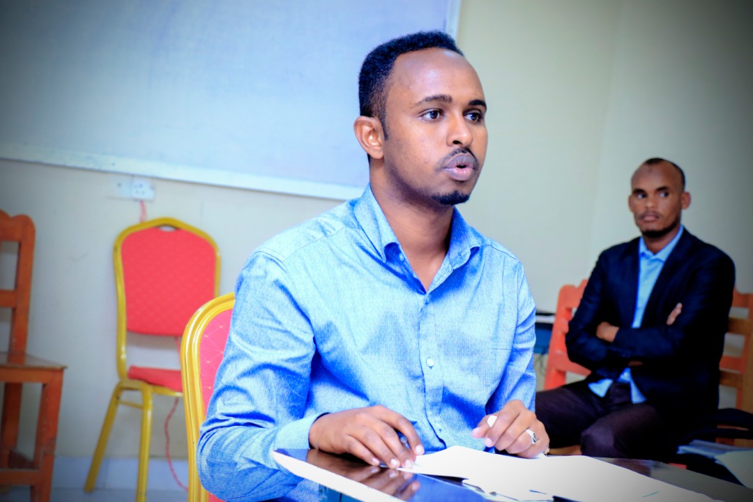 A student responding to questions from the panelists, at Amoud University School of Postgraduate Studies and Research (ASPGSR), during the Research Proposal Viva Voce conducted on Monday, January 27th, 2020 at Amoud University School of Postgraduate Studies and Research (ASPGSR), Borama Campus premises.
